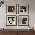 Four Framed Abstract Artworks On Wall With Wooden Cabinet And Decor Items