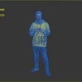 A Man In Yellow Hoodie With COMFORT Text Blue Jeans Colorful Sneakers Against Grey Background