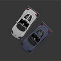 Two Silver And Blue Convertible Sports Cars With Sleek Design And Glossy Finish