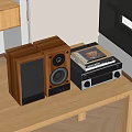 Natural Wood Finish Speakers On Wooden Table With Stereo System And Vinyl Records