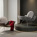 Modern Single Chairs With Wooden Metal Frames White Cushion Red Throw Blanket on Black Platform
