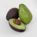 Fresh Avocados Display Whole Green Ripe And Halved With Brown Pit