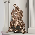 Golden Ornate Mantel Clock With Angel Figure Intricate Carvings And White Columns