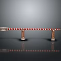 Red And White Striped Road Barrier With Wooden Support Posts