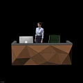 Front Desk Reception With Geometric Brown Design White Computer Monitor Green Chair And Woman Standing