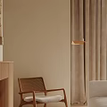 Woven Rattan Leisure Chair With Wooden Frame And Floor Lamp In Beige Living Space