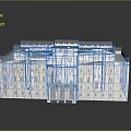 Symmetrical Multi Story Classical Building With White Exterior Yellow Accents Arched Doors And Windows