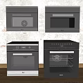 Black Kitchen Appliances Including Ovens And Microwaves In Brick Wall Background With Wooden Floor