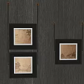 Three Black Framed Oil Paintings With Landscape Scenes Hanging On Gray Wall