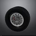 Car Tire With Silver Alloy Rim And Black Tread Design For Vehicles