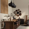 Modern Living Dining Room With Grey Sofa Wooden Table Pendant Lights And Wall Decor Plates