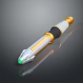 Futuristic Sci Fi Weapon With Gold White Black Cylindrical Design Green Glowing Tip Metallic Finish
