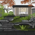 Traditional Karesansui Japanese Garden with Stones Moss Pathway Maple Trees and Wooden Pavilion