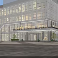 Modern Hotel Entrance Gate With Glass Facade And Landscaped Lawn Seating Area