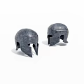 Two Ancient Spartan Helmets Displayed Side By Side On White Background 3d model