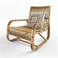 Rattan Rocking Leisure Chair with Neutral Cushion and Geometric Pattern Design