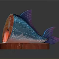 Sliced Fish With Blue Spotted Exterior And Red Interior On Circular Red Wooden Base