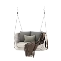 Cozy Wicker Hanging Chair With Gray Cushions And Brown Throw Blanket Design