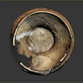 Ancient Hand Carved Pottery Bowl Featuring Cracked Texture And Broken Edges