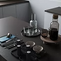 Elegant Modern Kitchen Table Setting With Tray Bottles Glasses Bowls And Cutlery