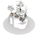 Modern White Tiered Display Shelves With Decorative Green Plants And Vases
