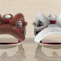 Brown and White Fluffy Lion Dance Dolls with Red Decorations and Reflections on Wooden Surface
