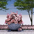 Blue And White Teacup Planter With Pink Roses Surrounded By Trees And Small Flowers