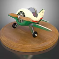 Vintage Green And White Propeller Passenger Airplane Model On Wooden Base