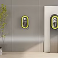 Modern Charging Stations On Gray Wall With Green Plant In Interior