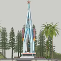 Tall Spire Tower With Red Star Top And Colorful Decorations Surrounded By Palm Trees