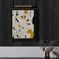 Abstract White Yellow Artwork On Dark Wooden Wall With Decorative Plant
