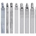 Traditional Stone Lion Pillars With Intricate Carvings Arranged In Row