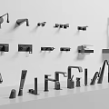 Various Styles Of Black Faucets Displayed On Wall And White Countertop