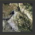 3D Terrain Model Showcasing Mountains Valleys Green Vegetation And Trails 3d model