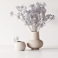 Beige Ceramic Vase with Purple Delicate Flowers and White Striped Container on White Surface Background