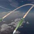 Green Missiles Flying In Blue Sky With Trailing Smoke And Clouds Over Ground