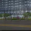 Urban Municipal Road With High Rise Buildings Trees Street Lamps Green Belt And White Railings