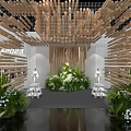 Contemporary Exhibition Display With Wooden Stick Structure Green Plants White Flowers Models And Water Reflection