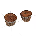 Freshly Baked Muffins With Brown Surface And Speckled Texture In Paper Liners On White Background