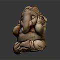 Light Brown Ganesha Sculpture With Detailed Trunk Ears Seated Posture On Dark Background With Reflection