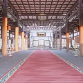 Traditional East Asian Shrine Main Hall Interior With Red Carpet Wooden Columns And Lattice Ceiling
