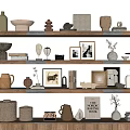 Curated Decorative Ornament Set on Wooden Shelves with Vases Frames Decorative Books and Sculptures