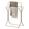 Bathroom Towel Rack with Golden Metal Frame Holding Brown and Light Gray Towels