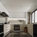 Modern Kitchen Interior With White Cabinets Black Appliances And Marble Countertops