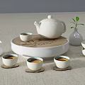 Elegant White Ceramic Tea Set with Teapot Cups Wooden Tray and Small Plant Vase