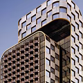 Elegant Modern Hotel Building With High Rise Glass Facade And Unique Design