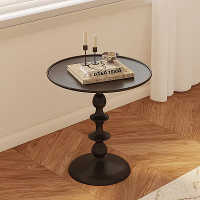Black Round Side Table With Magazine Candle Holder and Layered Base on Wooden Floor 3d model