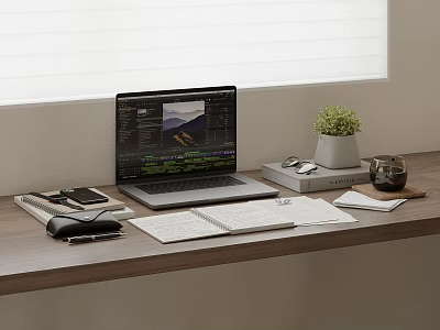 Laptop With Bright Screen On Wooden Desk Workspace Including Notebook Smartphone Potted Plant And Cup 3d model