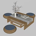 Rustic Wooden Tea Table with Woven Blue Cushions and Decorative Vase Twigs Book