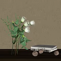 Transparent Glass Vase With White Flowers And Green Leaves On Light Gray Wall Background